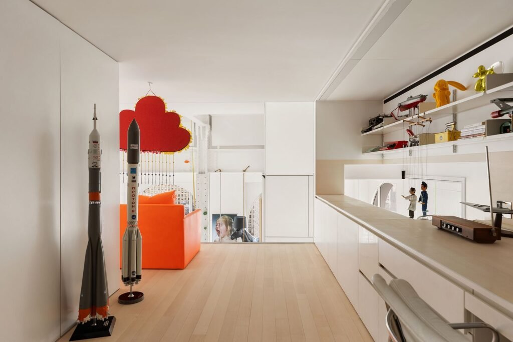 A $20m “sky house” atop a New York skyscraper stuns with a spiral slide, climbing wall and panoramic views, blending luxury living with bold, playful design