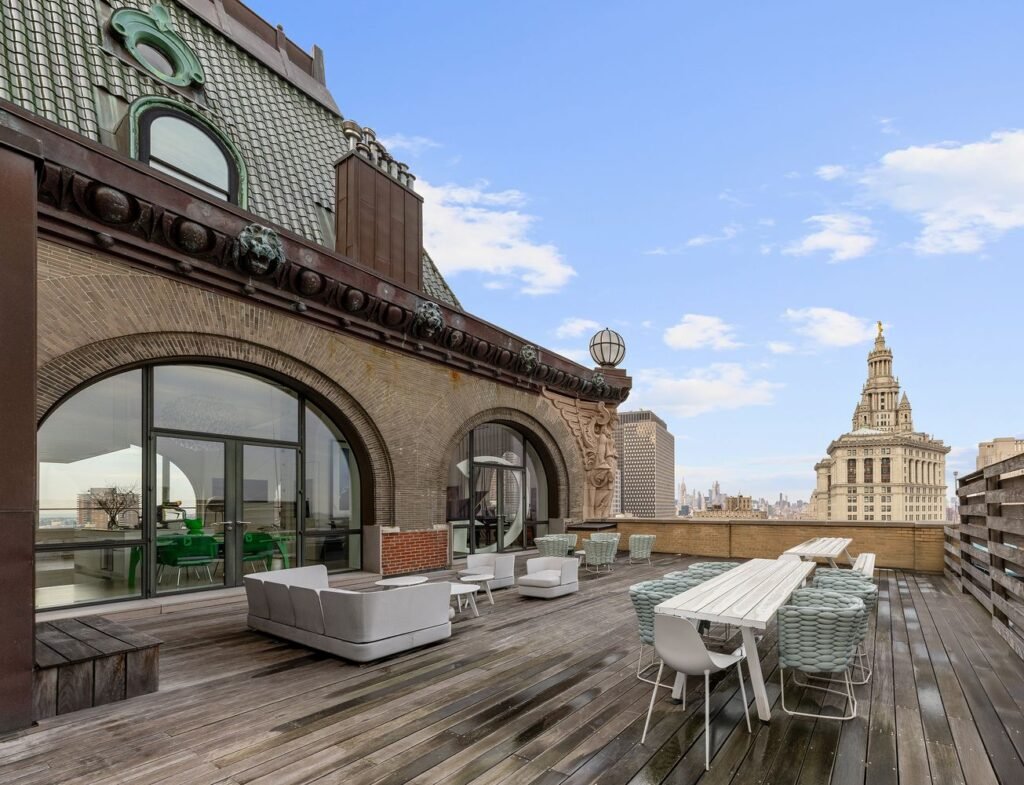 A $20m “sky house” atop a New York skyscraper stuns with a spiral slide, climbing wall and panoramic views, blending luxury living with bold, playful design
