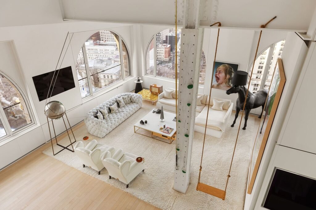 A $20m “sky house” atop a New York skyscraper stuns with a spiral slide, climbing wall and panoramic views, blending luxury living with bold, playful design