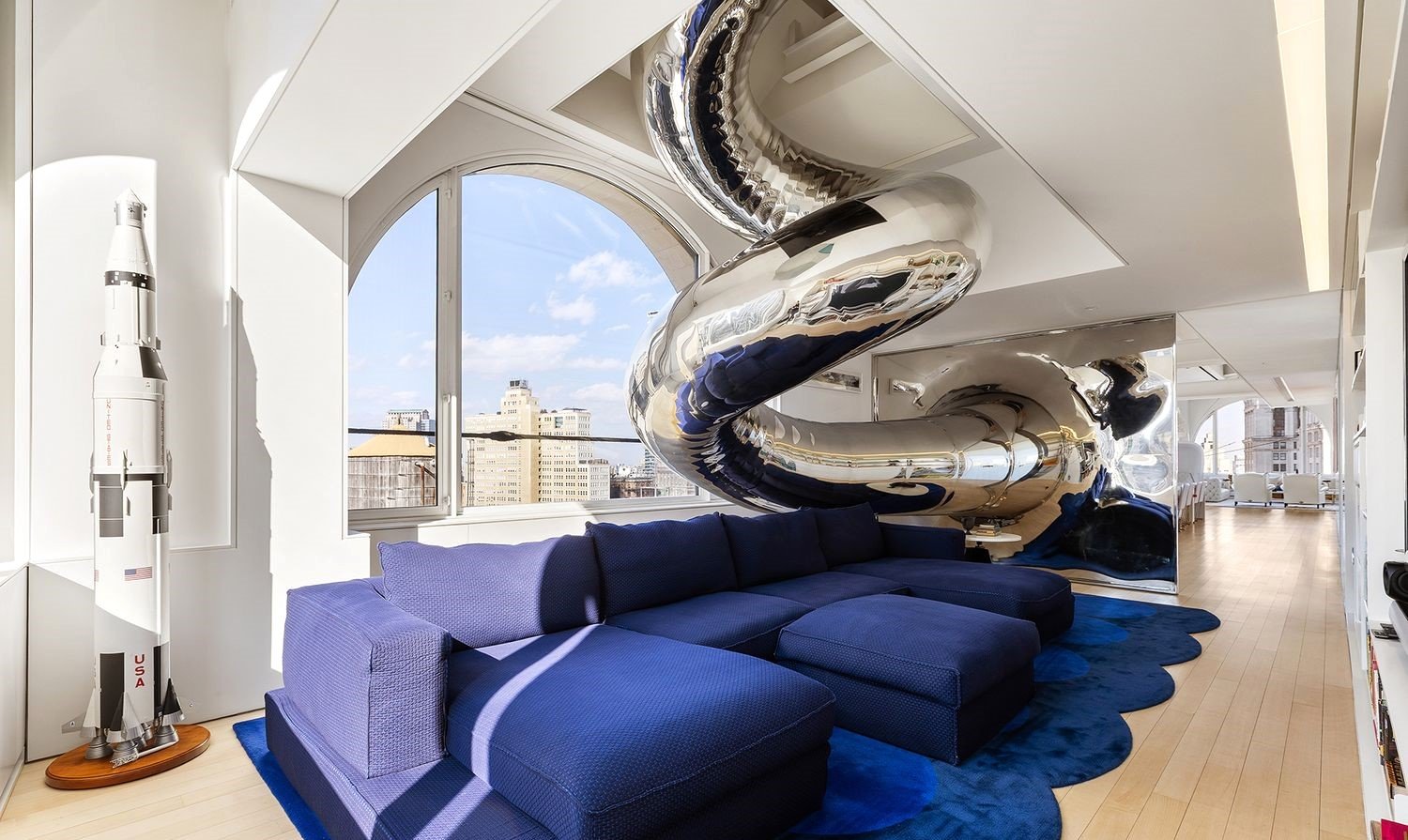 A $20m “sky house” atop a New York skyscraper stuns with a spiral slide, climbing wall and panoramic views, blending luxury living with bold, playful design