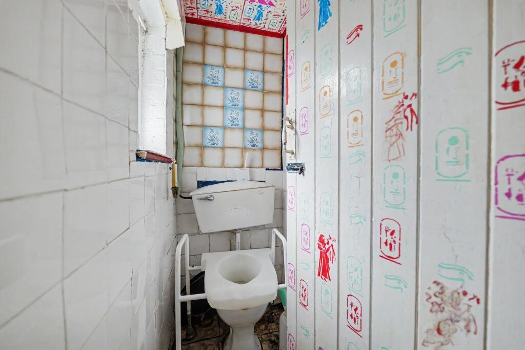 A £125,000 Nuneaton terrace with Egyptian murals, religious icons, and Jedward posters has left buyers baffled, but agents say it offers strong renovation potential.