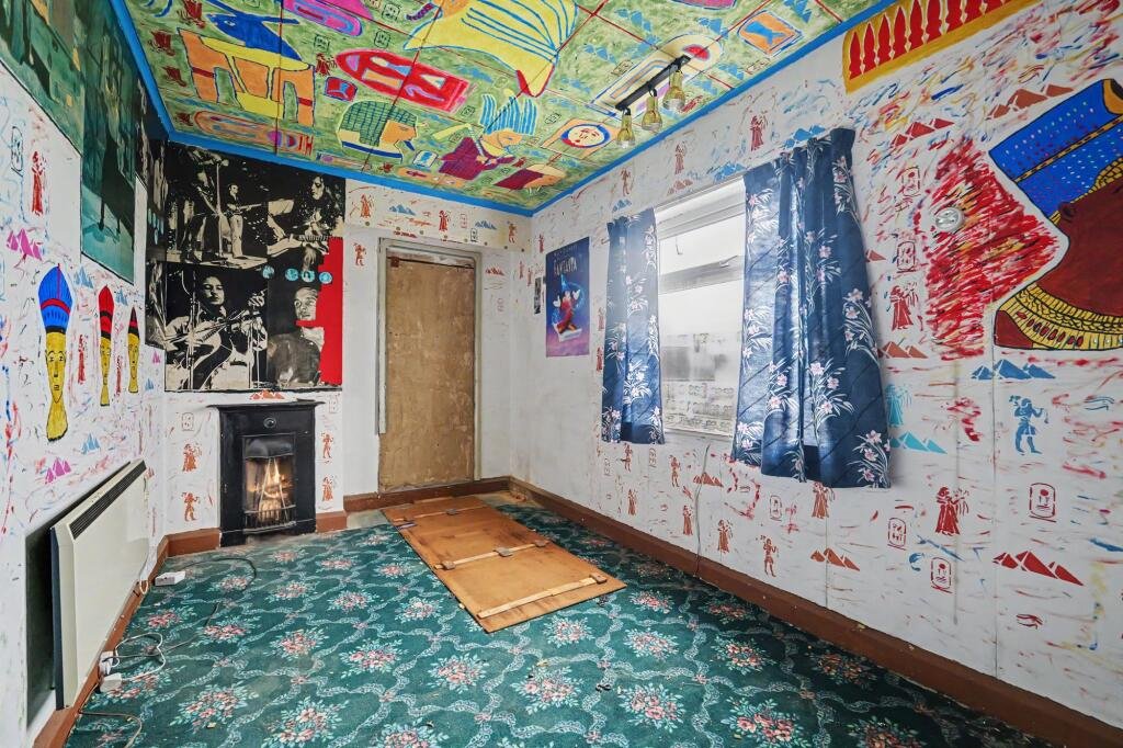 A £125,000 Nuneaton terrace with Egyptian murals, religious icons, and Jedward posters has left buyers baffled, but agents say it offers strong renovation potential.