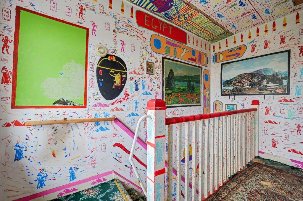 A £125,000 Nuneaton terrace with Egyptian murals, religious icons, and Jedward posters has left buyers baffled, but agents say it offers strong renovation potential.