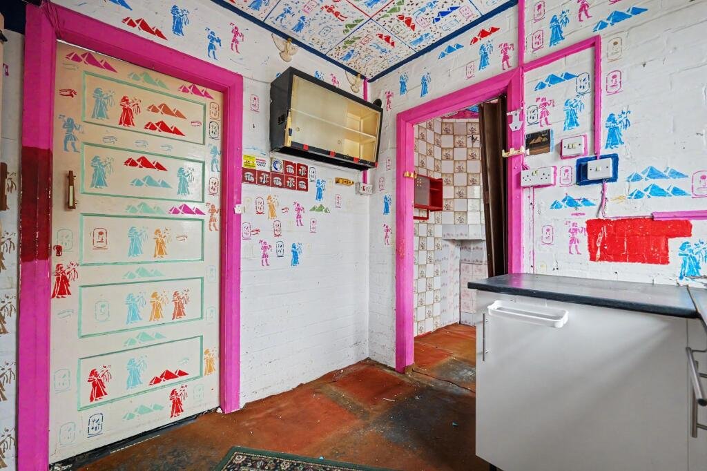 A £125,000 Nuneaton terrace with Egyptian murals, religious icons, and Jedward posters has left buyers baffled, but agents say it offers strong renovation potential.