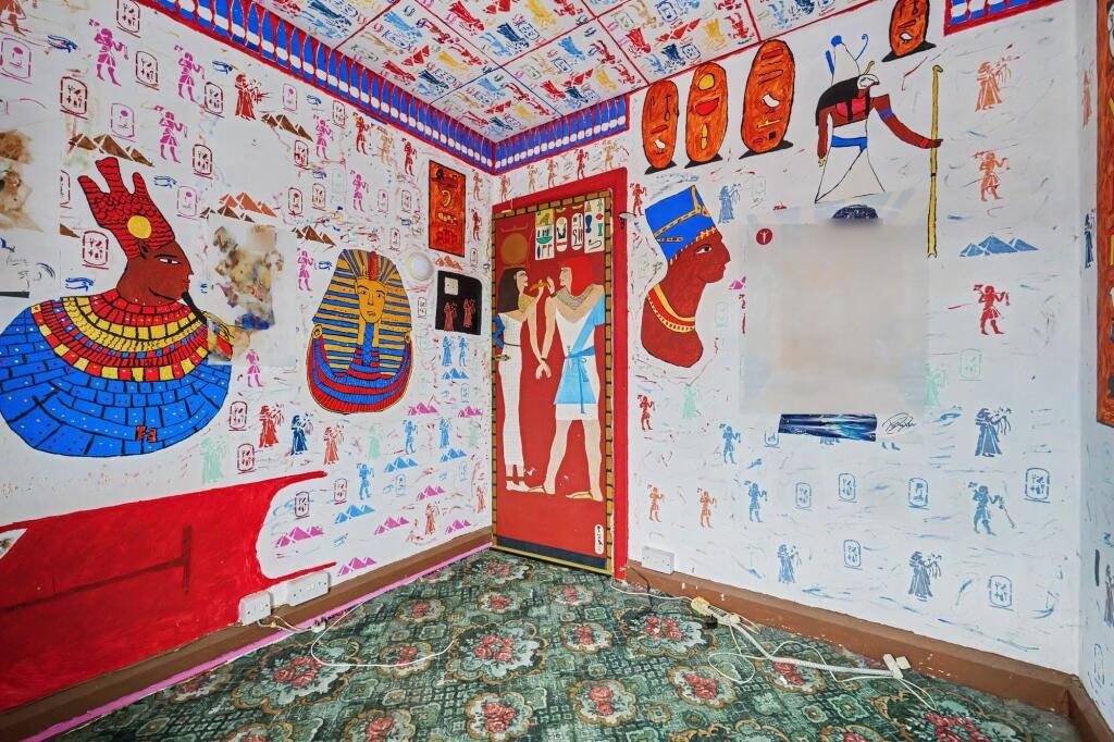 A £125,000 Nuneaton terrace with Egyptian murals, religious icons, and Jedward posters has left buyers baffled, but agents say it offers strong renovation potential.