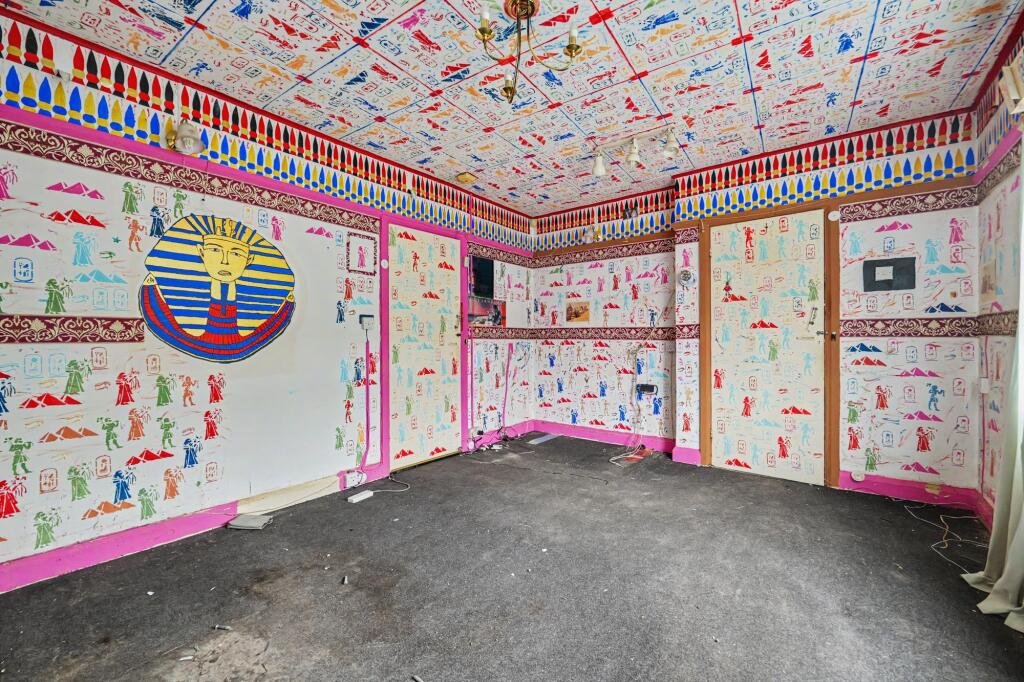 A £125,000 Nuneaton terrace with Egyptian murals, religious icons, and Jedward posters has left buyers baffled, but agents say it offers strong renovation potential.