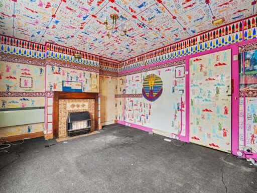 A £125,000 Nuneaton terrace with Egyptian murals, religious icons, and Jedward posters has left buyers baffled, but agents say it offers strong renovation potential.