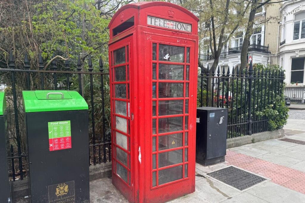 A Grade II listed red K6 phone box in Chelsea is going under the hammer for £7,500, offering a rare chance to own a British icon with endless quirky conversion possibilities.