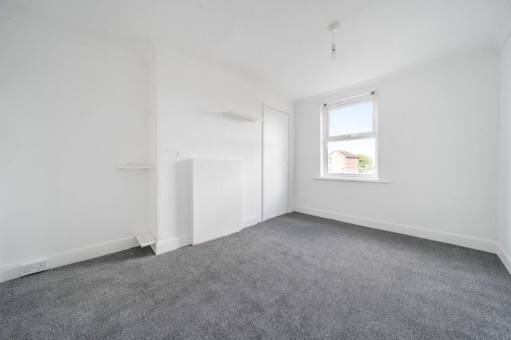 An eight-bedroom home next door to Fred West's infamous Gloucester murder house is on the market, with agents warning buyers of the street's dark and notorious history.