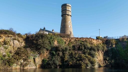 A historic 69ft windmill in Guernsey, once a WWII lookout, is for sale with plans to convert it into a striking four-bedroom home with observation deck and quarry views.