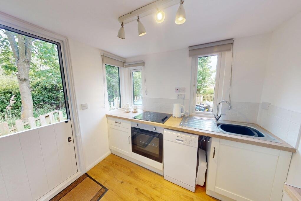 A historic converted windmill in the Norfolk Broads has hit the market for £495,000, offering river views, original features and a rare private mooring in a tranquil setting.