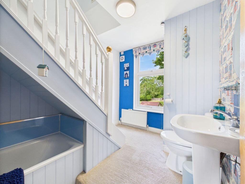 A £225,000 North Yorkshire coastal cottage has raised eyebrows with its open-plan bathroom sitting by the staircase, despite an otherwise stylish and freshly refurbished interior.