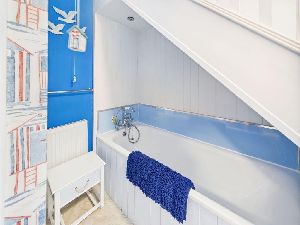 A £225,000 North Yorkshire coastal cottage has raised eyebrows with its open-plan bathroom sitting by the staircase, despite an otherwise stylish and freshly refurbished interior.
