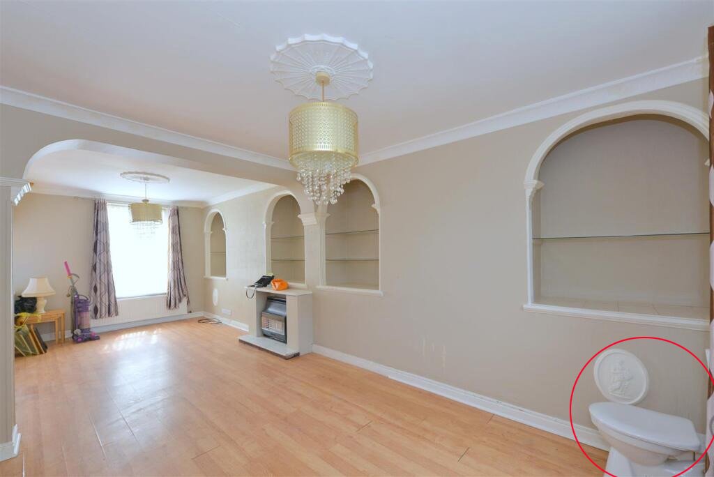 A three-bedroom Shrewsbury home listed for £260,000 has left buyers baffled after photos revealed a toilet and hand basin sitting openly in the corner of the dining room.