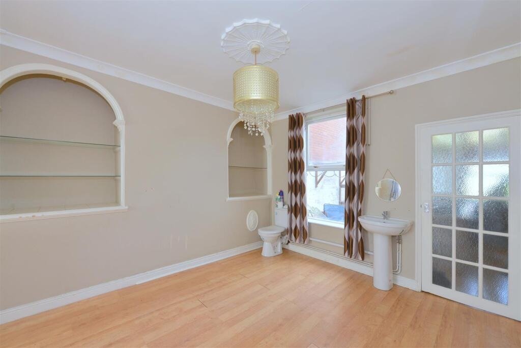 A three-bedroom Shrewsbury home listed for £260,000 has left buyers baffled after photos revealed a toilet and hand basin sitting openly in the corner of the dining room.