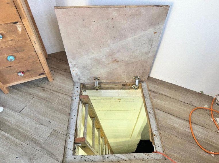 A four-bedroom home near the coast has hit the market with a hidden WWII bunker beneath its garden, offering a unique twist on a traditional family property.