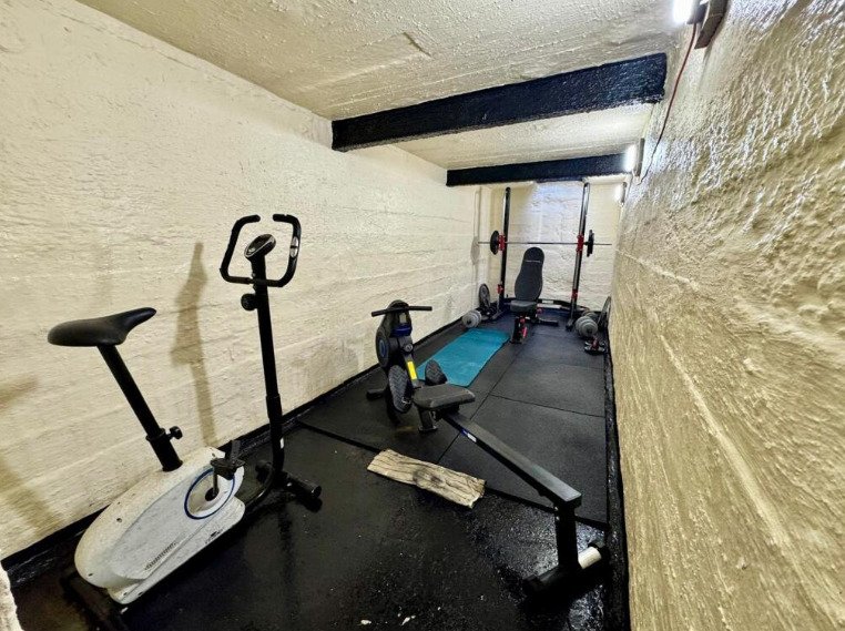 A four-bedroom home near the coast has hit the market with a hidden WWII bunker beneath its garden, offering a unique twist on a traditional family property.