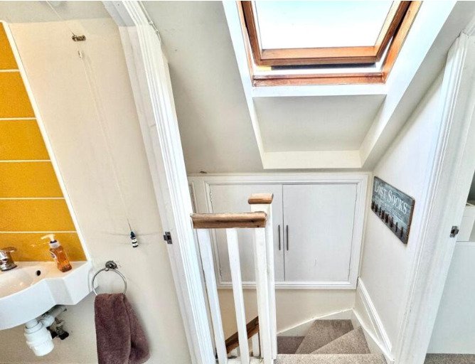 A four-bedroom home near the coast has hit the market with a hidden WWII bunker beneath its garden, offering a unique twist on a traditional family property.