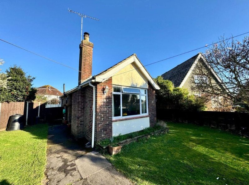 A four-bedroom home near the coast has hit the market with a hidden WWII bunker beneath its garden, offering a unique twist on a traditional family property.