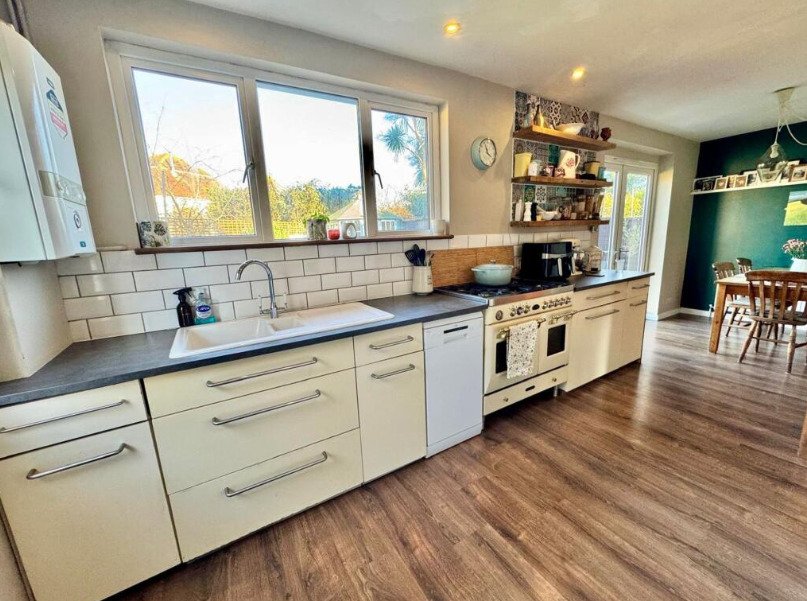 A four-bedroom home near the coast has hit the market with a hidden WWII bunker beneath its garden, offering a unique twist on a traditional family property.