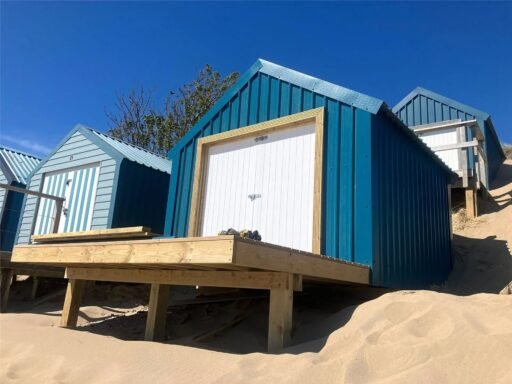 A small beach hut without mains power on sale for £200,000 at Abersoch beach, Gwynedd, Wales - same price as nearby houses with stunning Cardigan Bay views.