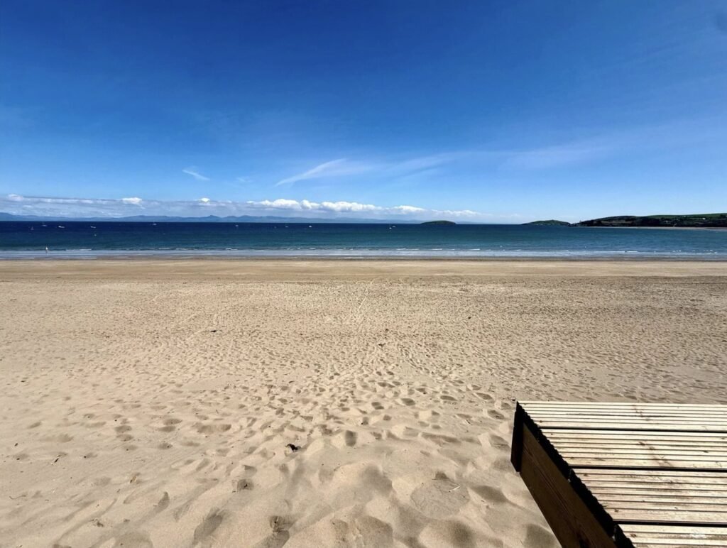 A small beach hut without mains power on sale for £200,000 at Abersoch beach, Gwynedd, Wales - same price as nearby houses with stunning Cardigan Bay views.