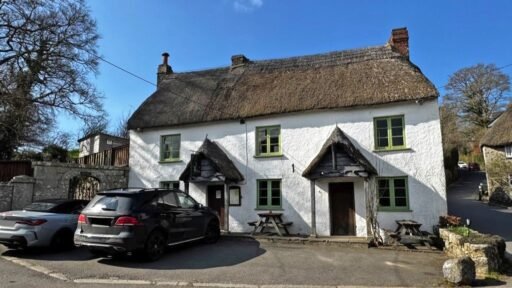 A 400-year-old thatched Devon pub once owned by a British oil tycoon is on sale for just £150,000, offering a rare slice of Dartmoor countryside charm in need of restoration.
