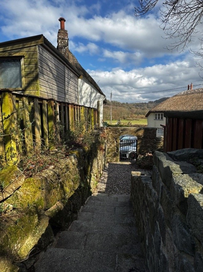 A 400-year-old thatched Devon pub once owned by a British oil tycoon is on sale for just £150,000, offering a rare slice of Dartmoor countryside charm in need of restoration.
