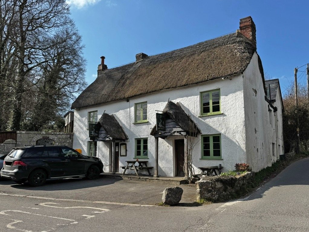 A 400-year-old thatched Devon pub once owned by a British oil tycoon is on sale for just £150,000, offering a rare slice of Dartmoor countryside charm in need of restoration.