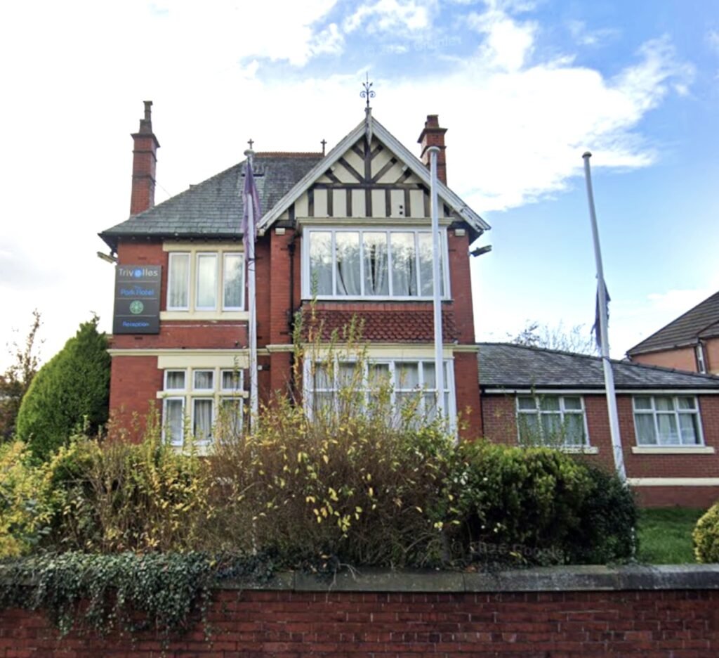 A dilapidated hotel bedroom with stained carpets and peeling wallpaper in Preston is on sale for £40,000, leaving bewildered Brits questioning what exactly they would be buying.