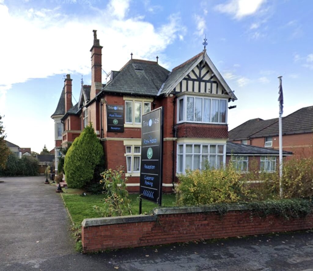 A dilapidated hotel bedroom with stained carpets and peeling wallpaper in Preston is on sale for £40,000, leaving bewildered Brits questioning what exactly they would be buying.
