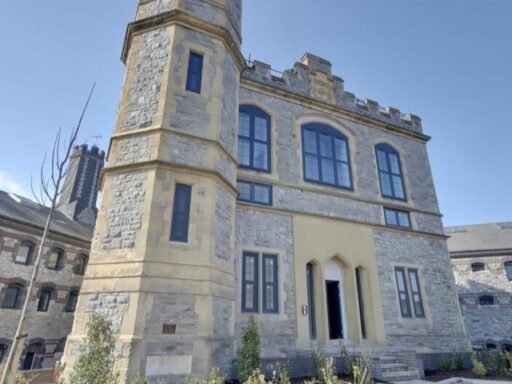 A luxury flat inside one of Britain's most notorious former prisons is on the market for £180,000 - the Victorian jail once housed serial killer Archibald Hall and EastEnders star Leslie Grantham.