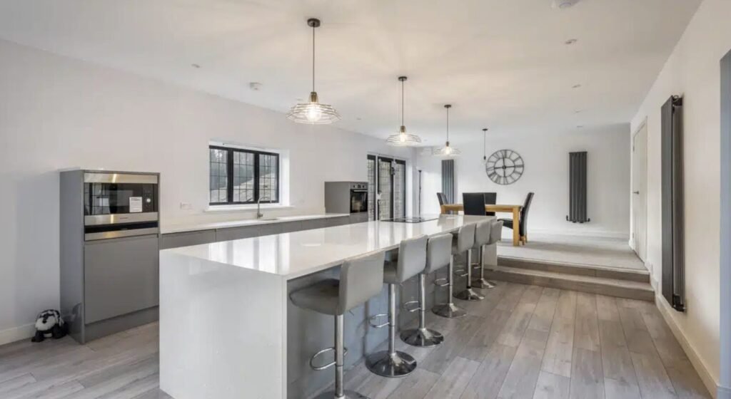 A stunning 10-bedroom Hampshire mansion designed in the 1920s has hit the market for £3.25m - complete with a Harrier jump jet sitting proudly on the back lawn.