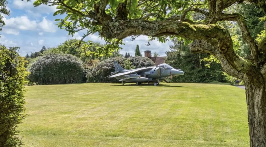 A stunning 10-bedroom Hampshire mansion designed in the 1920s has hit the market for £3.25m - complete with a Harrier jump jet sitting proudly on the back lawn.