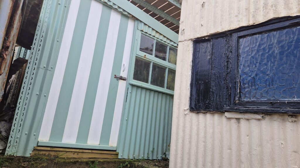 A tiny 11ft beach hut with its own rooftop sun deck has hit the market for £50,000 after being owned by the same family for more than 60 years.