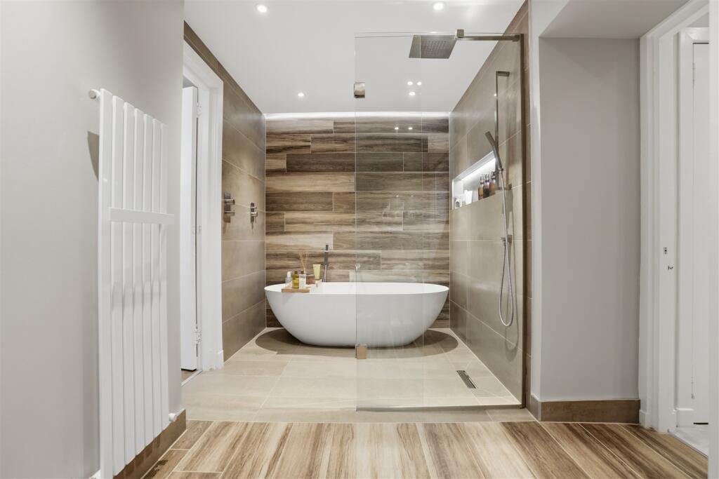 A Victorian flat on the market for £500,000 in Scotland comes with a rather unusual feature - a downstairs loo that appears to double as a fully stocked wine cellar.