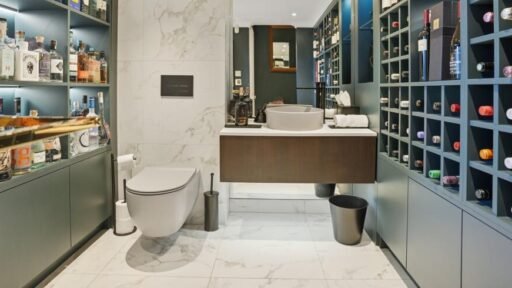 A Victorian flat on the market for £500,000 in Scotland comes with a rather unusual feature - a downstairs loo that appears to double as a fully stocked wine cellar.