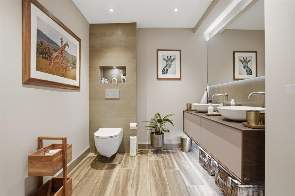 A Victorian flat on the market for £500,000 in Scotland comes with a rather unusual feature - a downstairs loo that appears to double as a fully stocked wine cellar.