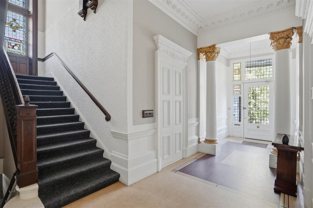 A Victorian flat on the market for £500,000 in Scotland comes with a rather unusual feature - a downstairs loo that appears to double as a fully stocked wine cellar.