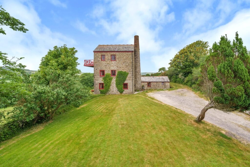 A Grade II-listed Cornish tin mine engine house has gone on sale for £500,000 after being converted into a striking five-floor, three-bedroom home with countryside views.
