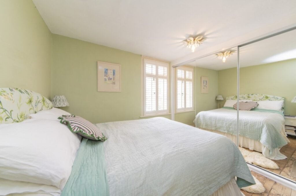One of Britain's narrowest homes, an 18th-century cottage just 16ft wide, is on the market for £500,000 - with a main bedroom the same size as a Tube carriage.
