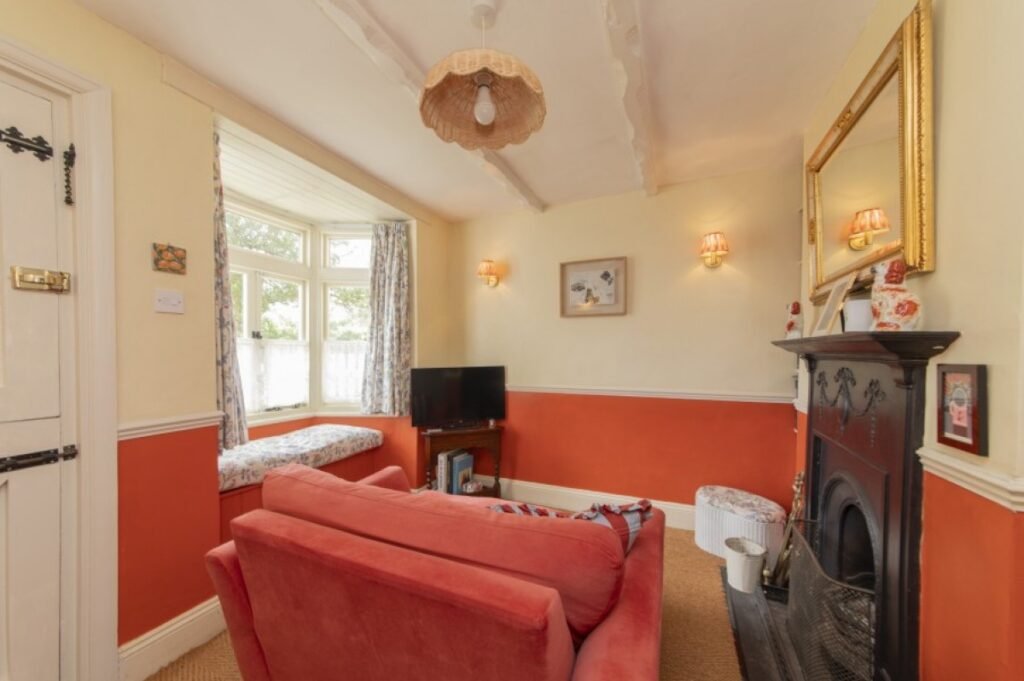 One of Britain's narrowest homes, an 18th-century cottage just 16ft wide, is on the market for £500,000 - with a main bedroom the same size as a Tube carriage.