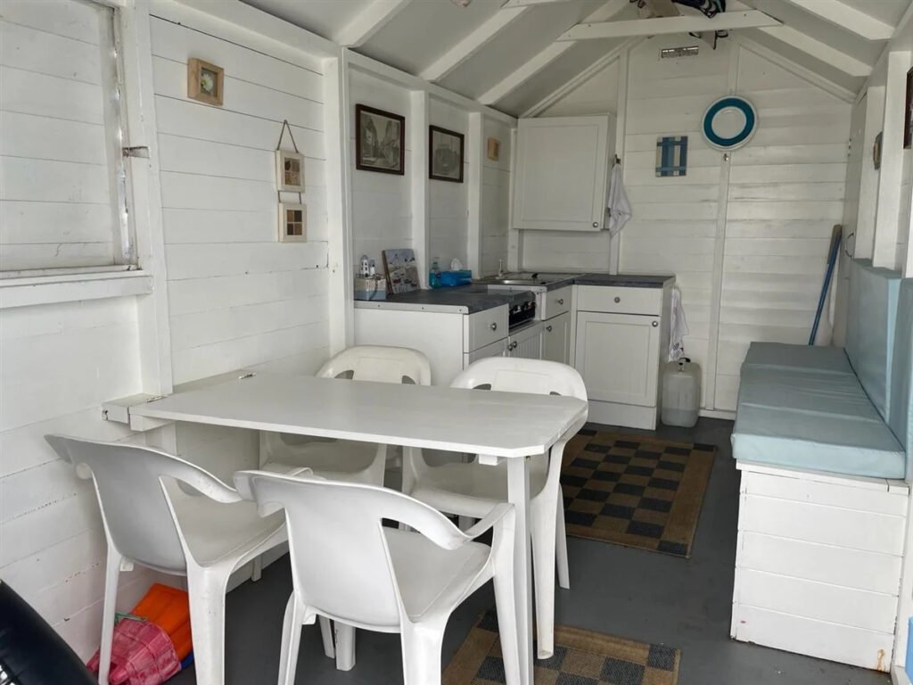 Tiny beach huts are still commanding eye-watering prices - with one in Christchurch, Dorset, on the market for a staggering £425,000 despite falling demand.