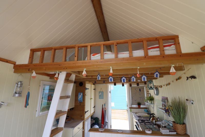 Tiny beach huts are still commanding eye-watering prices - with one in Christchurch, Dorset, on the market for a staggering £425,000 despite falling demand.