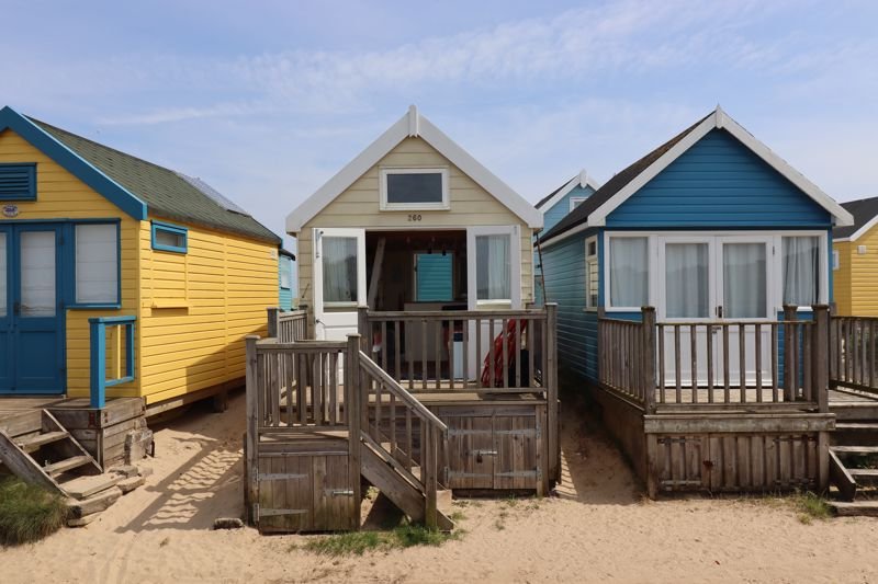 Tiny beach huts are still commanding eye-watering prices - with one in Christchurch, Dorset, on the market for a staggering £425,000 despite falling demand.