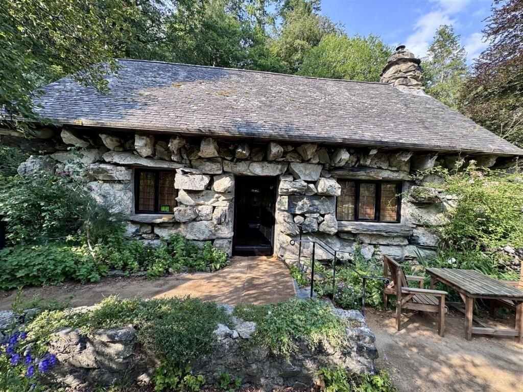 A famous ugly house steeped in Welsh folklore has gone on sale for £199,000 - but locals are furious and have launched a petition to pause the auction.