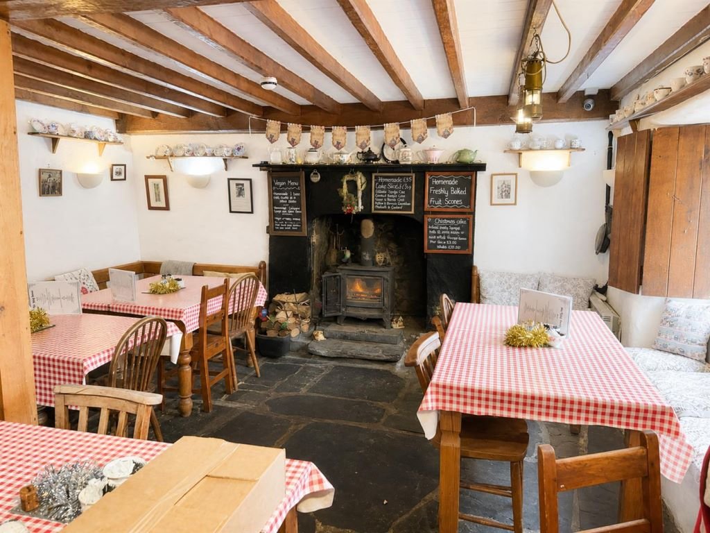 A famous ugly house steeped in Welsh folklore has gone on sale for £199,000 - but locals are furious and have launched a petition to pause the auction.