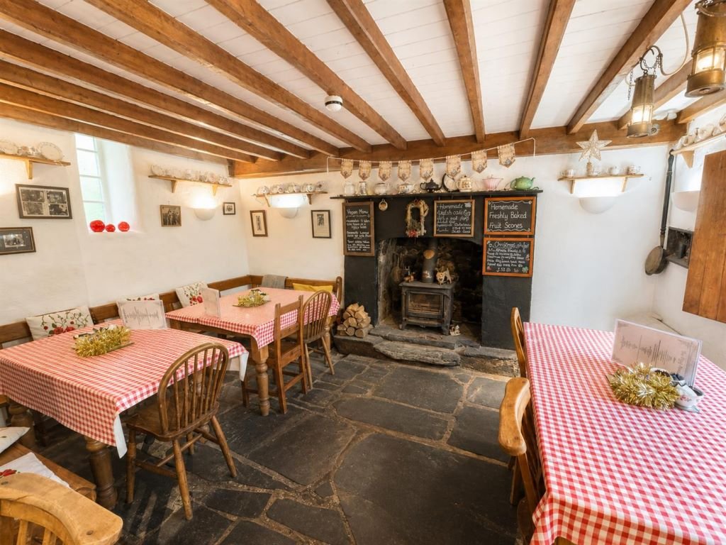 A famous ugly house steeped in Welsh folklore has gone on sale for £199,000 - but locals are furious and have launched a petition to pause the auction.