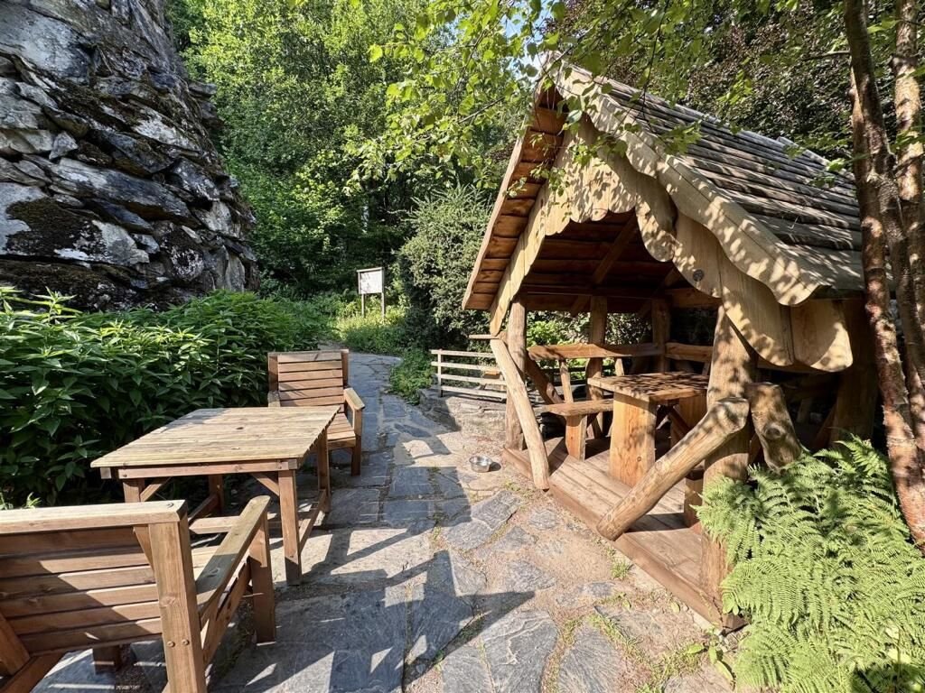 A famous ugly house steeped in Welsh folklore has gone on sale for £199,000 - but locals are furious and have launched a petition to pause the auction.