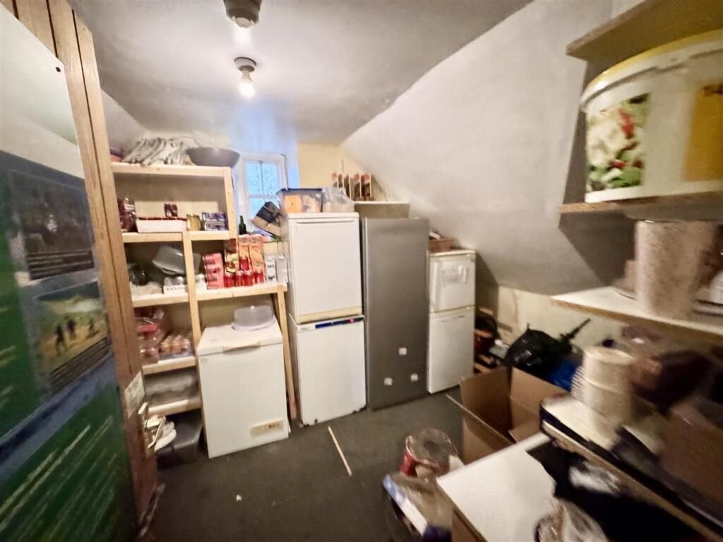 A famous ugly house steeped in Welsh folklore has gone on sale for £199,000 - but locals are furious and have launched a petition to pause the auction.
